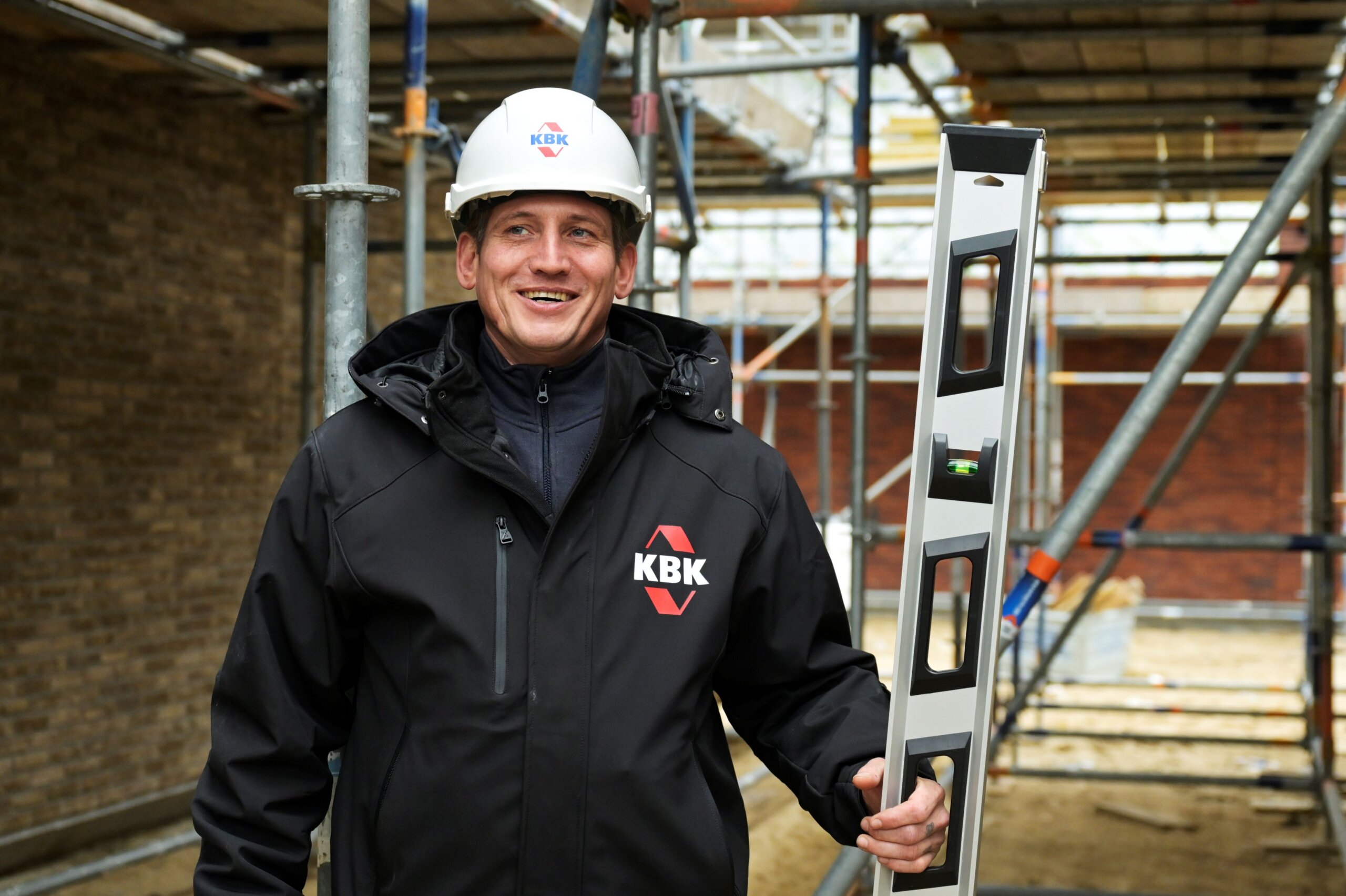 Uitvoerder met waterpas