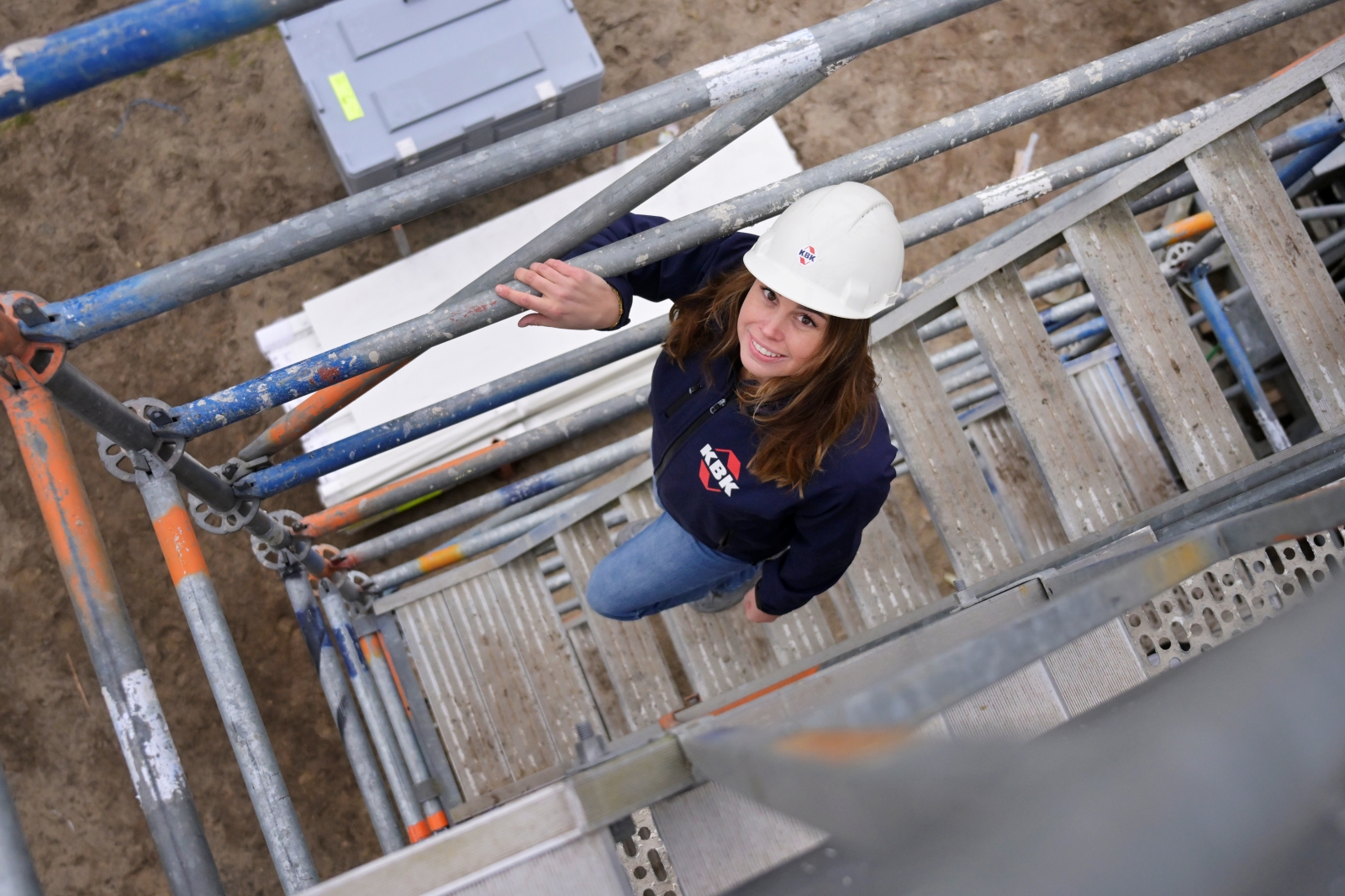 Calculator op trap van steiger